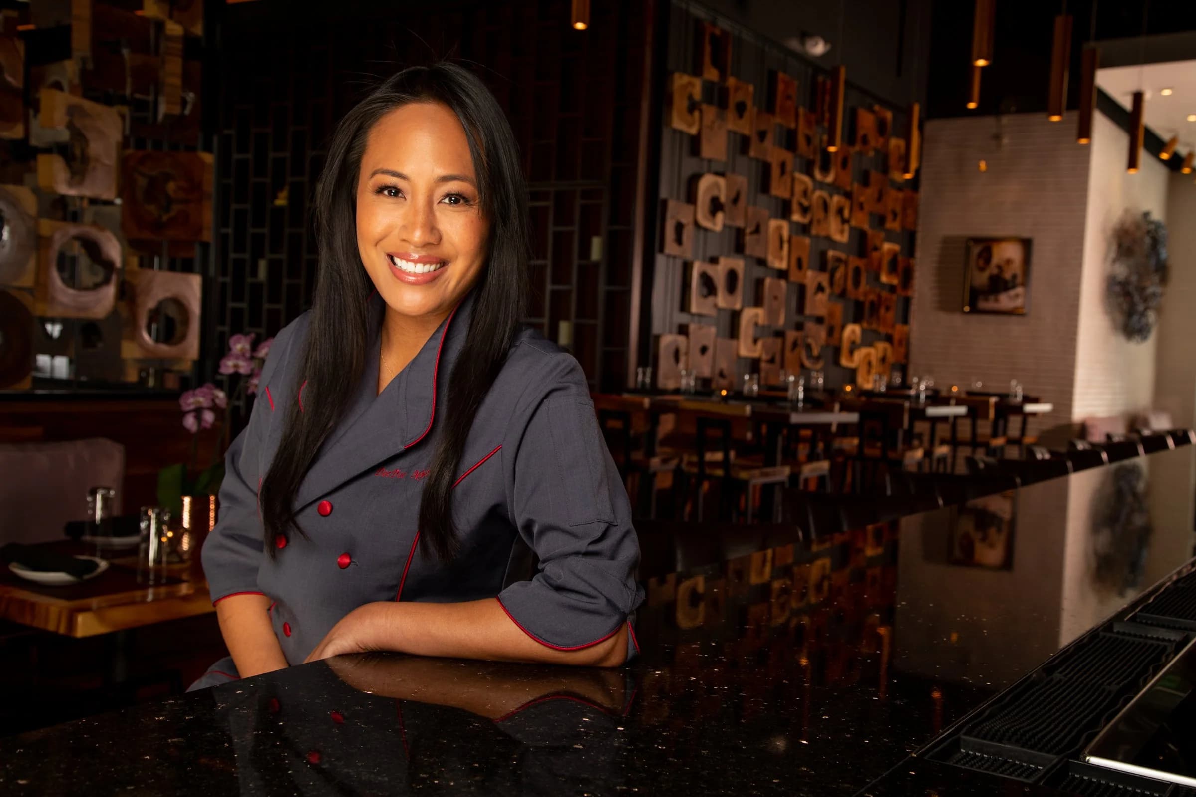 Chef-Owner DeeDee Niyomkul in the dining room