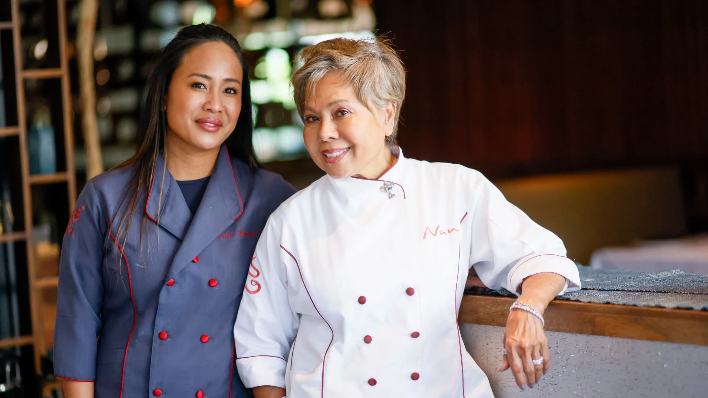 Chef DeeDee and Chef Nan together at a Nan Thai dining table